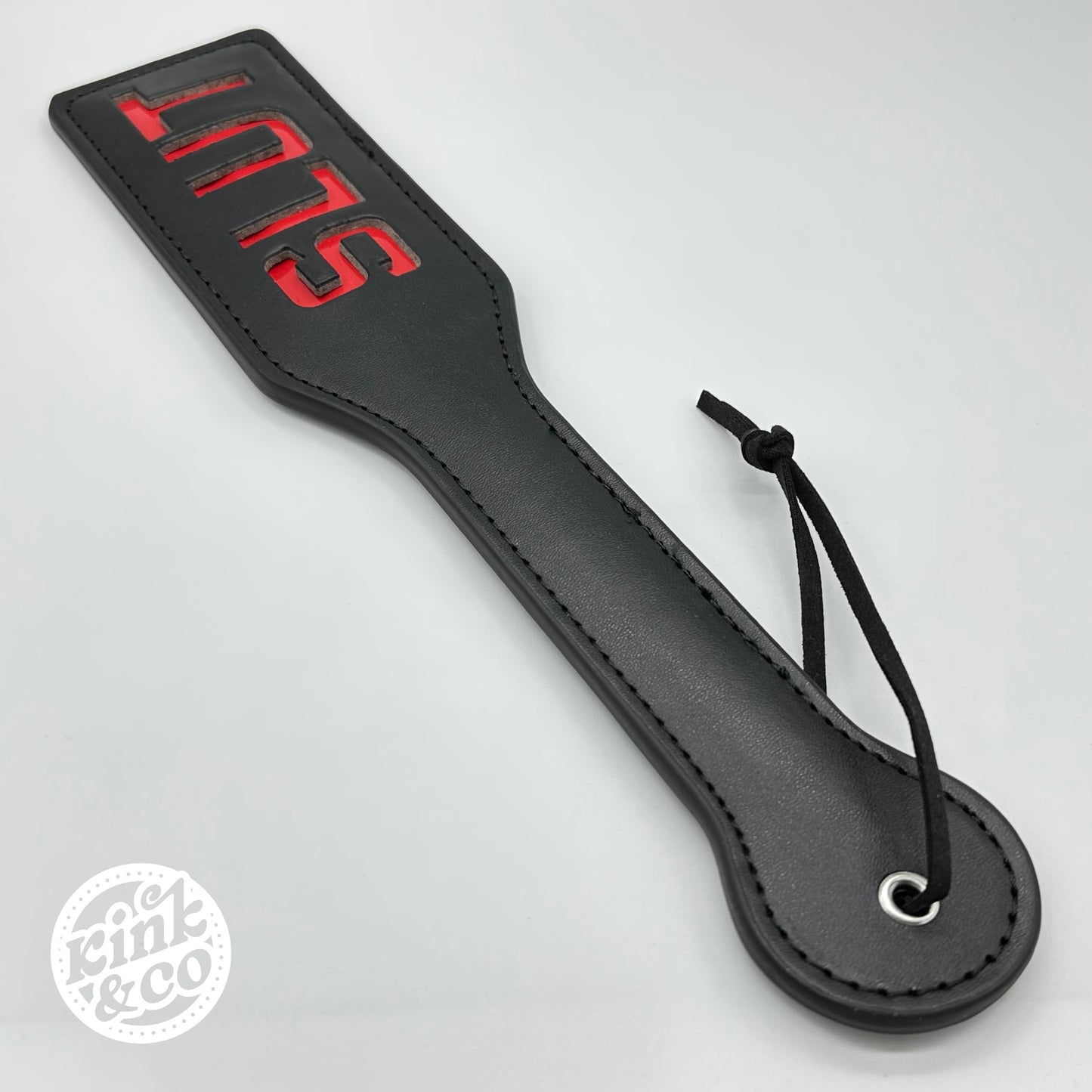 Slut-Slapper-Paddel aus Leder – von Kink&Co