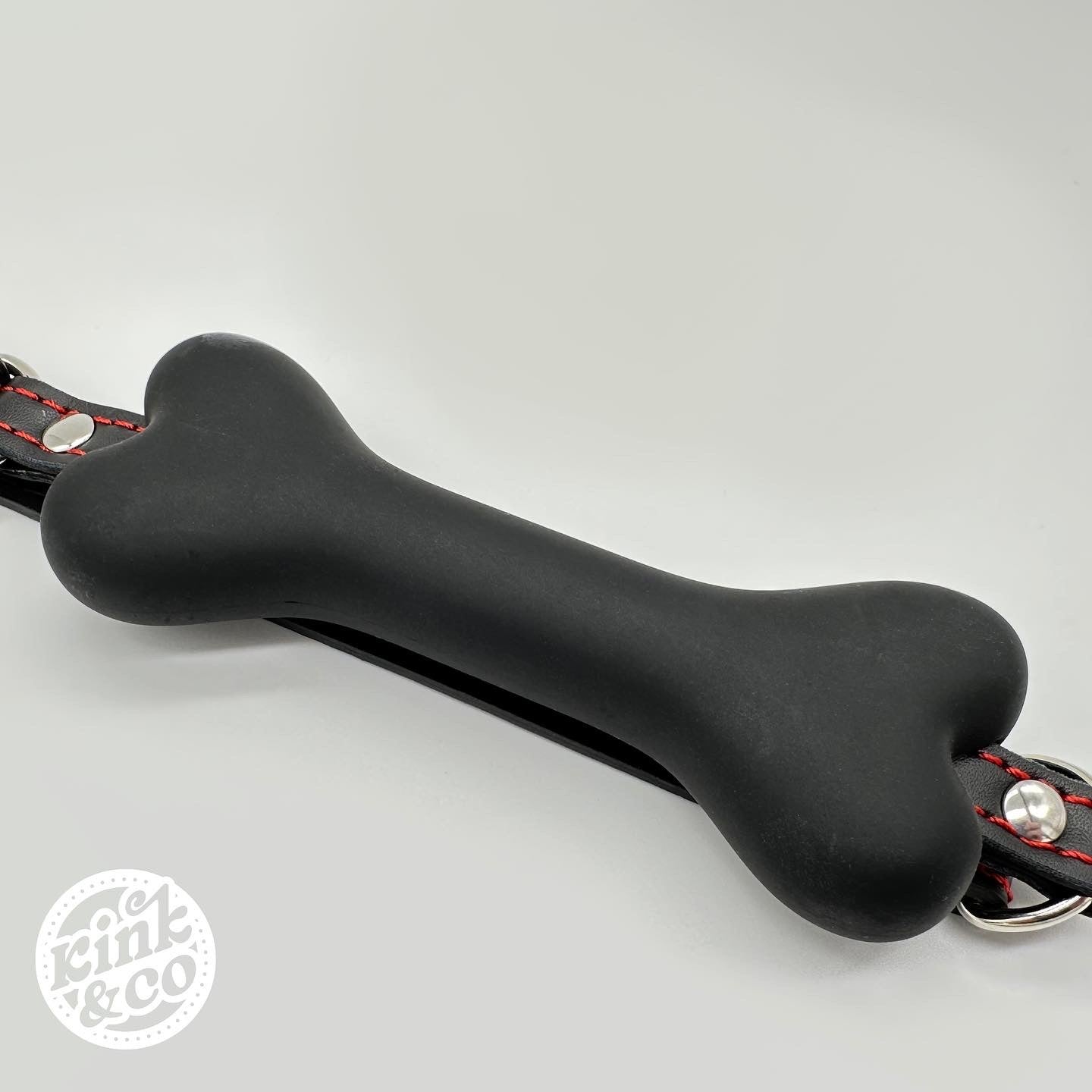 BDSM-Knochenknebel aus Silikon mit Lederriemen