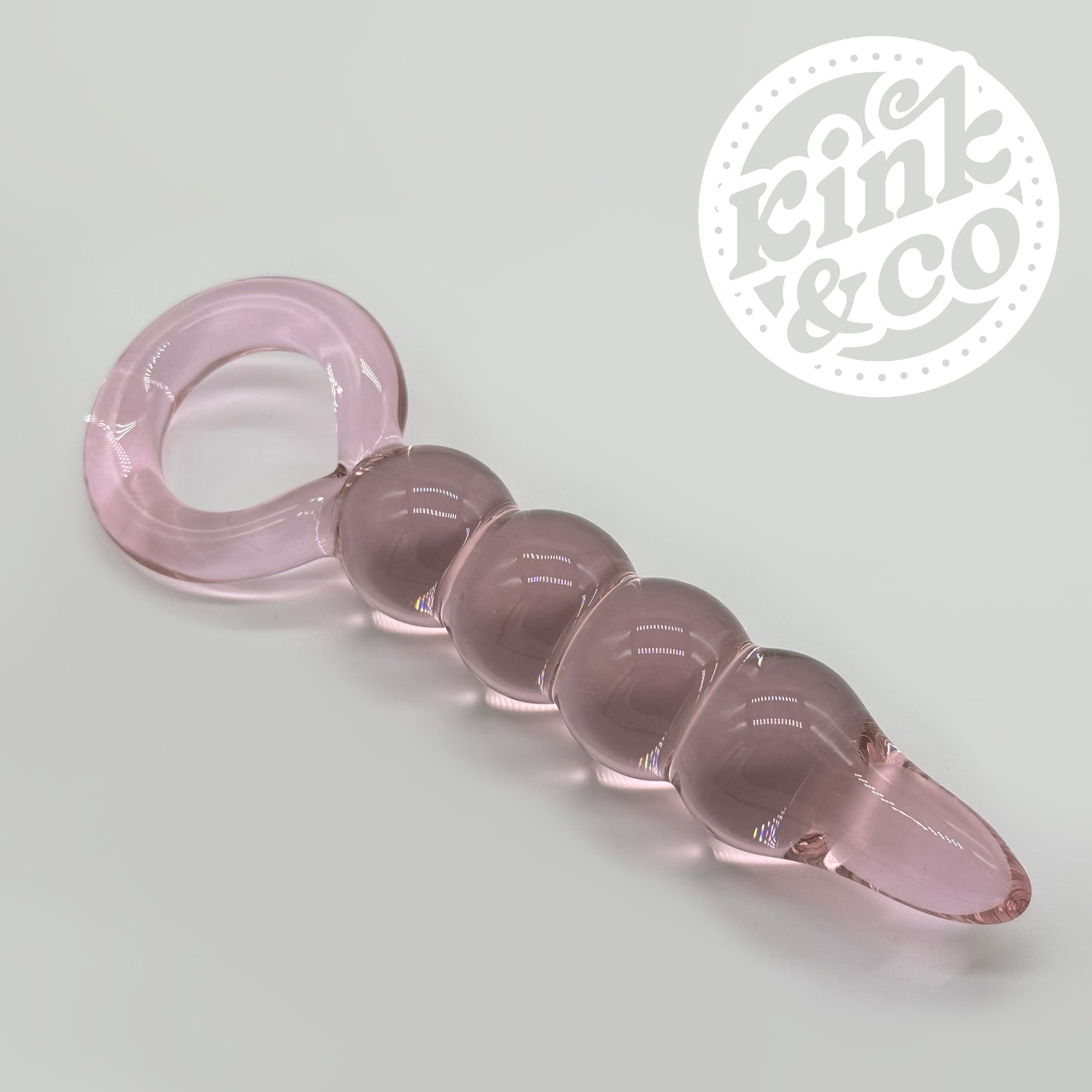Pink Glass anal beads with O ring Handle - By Kink&Co