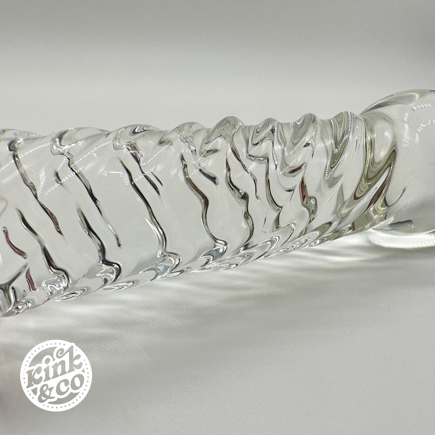 Texture of Glass Dildo Pink Heart With Spiral Ridged Body - By Kink&Co