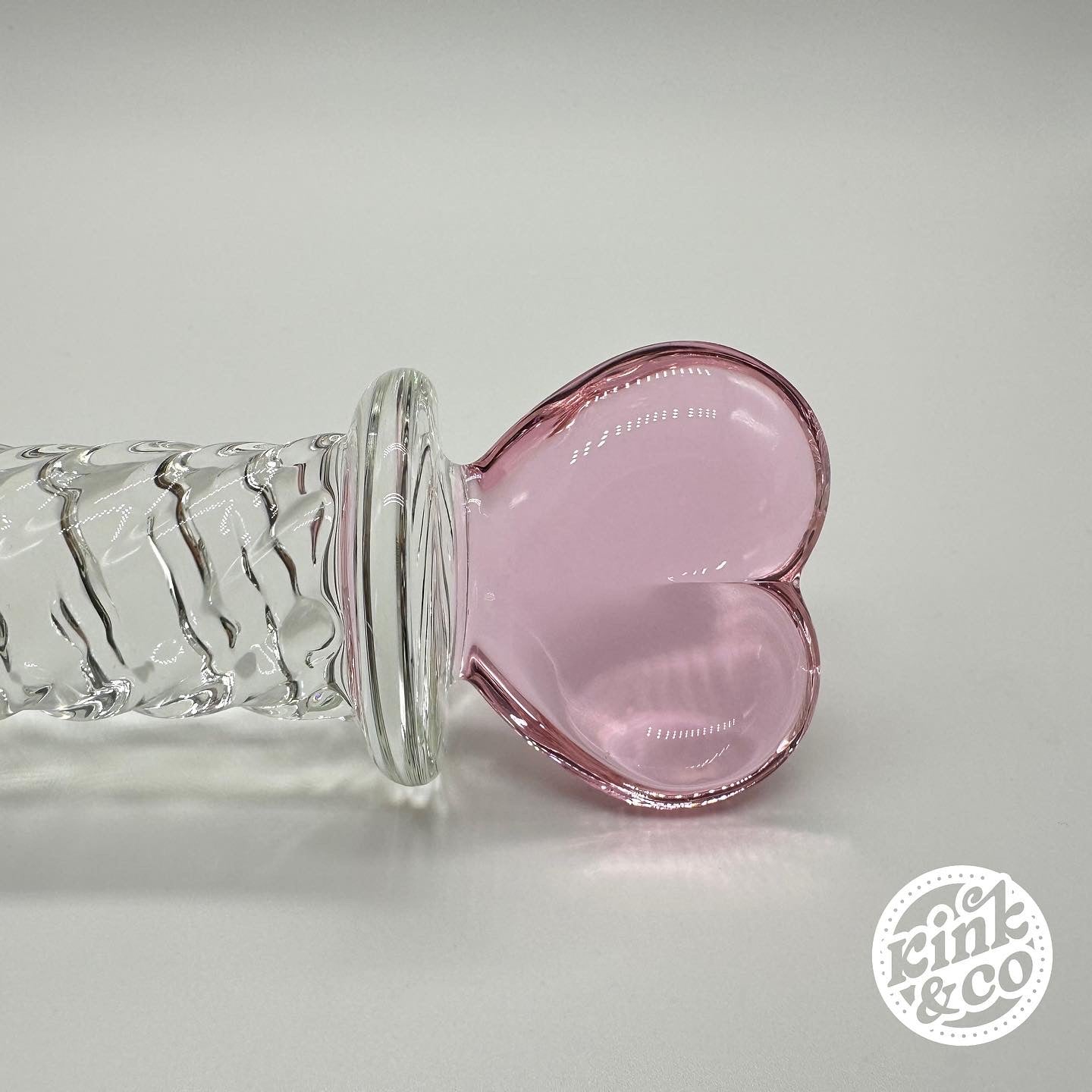 Heart top of Glass Dildo Pink Heart With Spiral Ridged Body - By Kink&Co